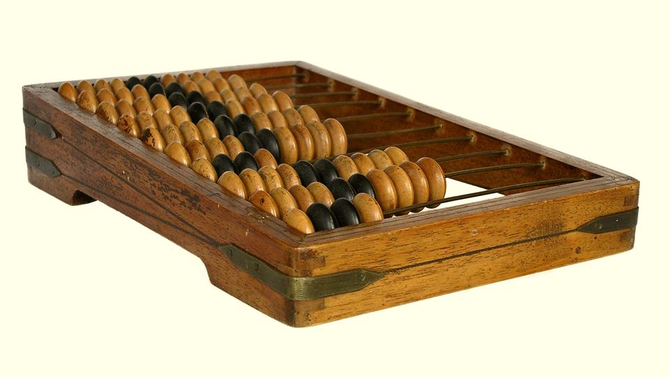 A wooden abacus with dark beads