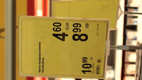 Yellow shelf price tags in a shop